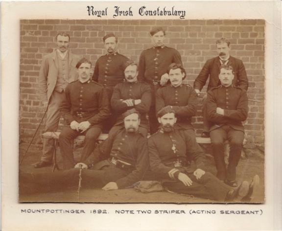 Photograph of Royal Irish Constabulary at Mountpottinger Barracks in 1892. Included in the group are two plain-clothed detectives