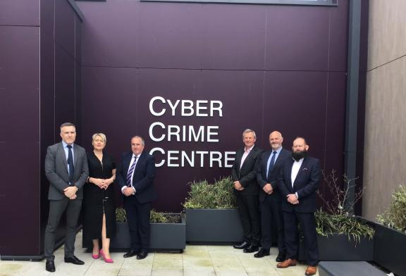 Pictured from left to right are: Detective Chief Superintendent Andy Hill, Detective Superintendent Emma Neill, Mark Goodfellow (DoJ), Permanent Secretary Richard Pengelly, Detective Chief Inspector Paul Woods, and Graham Walker, Head of International Criminal Justice Cooperation.