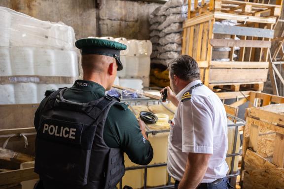Police Service of Northern Ireland officer working alongside colleagues from HMRC during searches in the Newry area on Friday, June 16th.