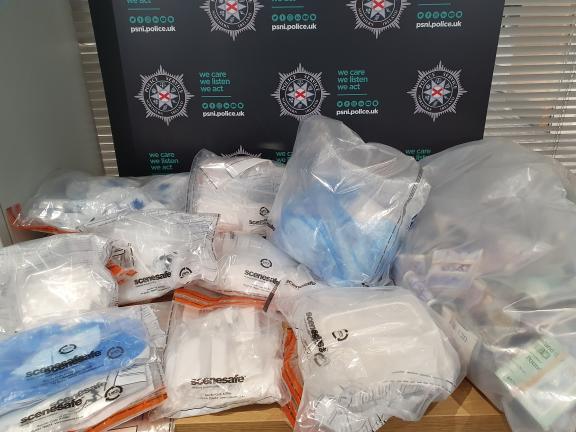 CAPTION: Some of the drugs, deal bags and cash seized during today's searches in north Belfast and Glengormley.