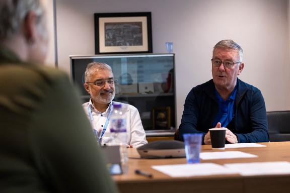 Vice Chair of the Board's Partnership Committee Mukesh Sharma and Mike Nesbitt