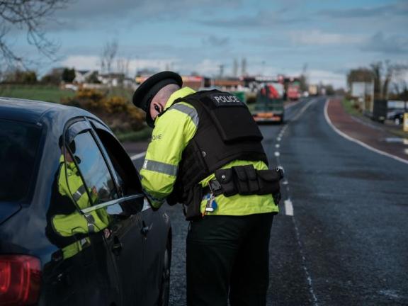 Police Officer stopping vehicle