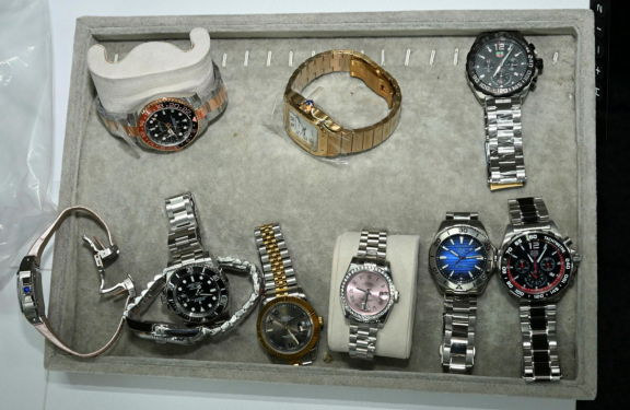 Just some of the designer watches seized by police.