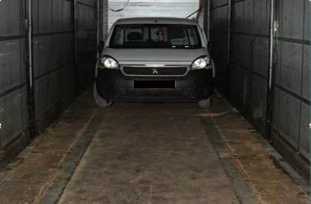 The Class A and B drugs were concealed within a separate vehicle inside the trailer and in a hide built into the floor of the trailer.