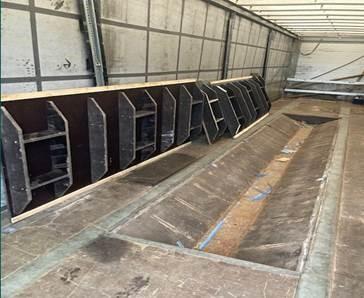 The hide built into the floor of the trailer.