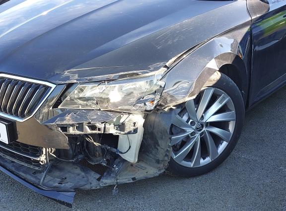 Damage to the police vehicle.