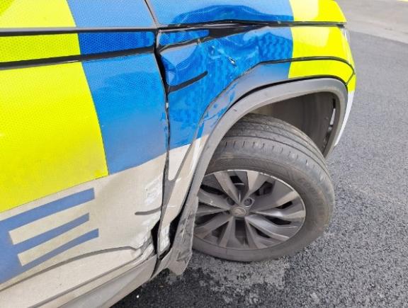Damage to police vehicle