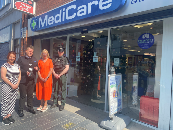 Left to right: Emma McGill, Strabane Town Centre Development Manager, Jon McGinley, Manager, Medicare, Strabane, Vanessa Russell, Derry & Strabane PCSP and a local Neighbourhood officer. 