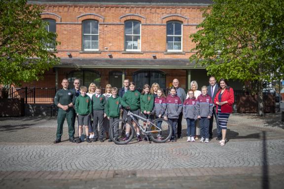 Stakeholders and supporters of the Bike Project pictured with one of the refurbished bikes outside Dromore Town Hall.