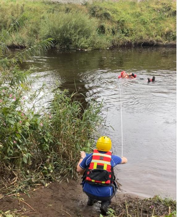 Staged water rescue using throw line on Strule River, Omagh