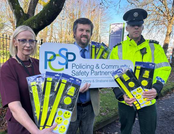 Pictured (left to right) are: Vanessa Russell Derry and Strabane PCSP Manager, Keith Kerrigan, Chair of Derry and Strabane PCSP and Chief Inspector Graeme Craig with some of the reflective kits being made available to schoolchildren.