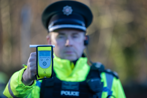 Chief Superintendent Sam Donaldson with a roadside alcohol testing kit 021225 (002)