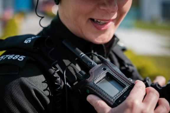 Police Officer talking into their police radio