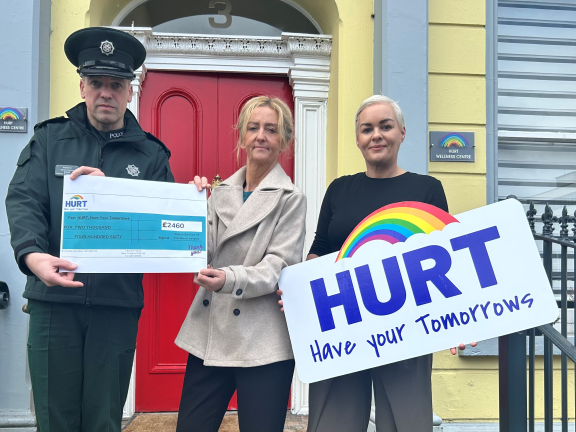 Inspector Cathal Pearce, Pauline McCloskey, Finance Officer and Leanne Doherty, Business Development and Social Enterprise Manager for HURT