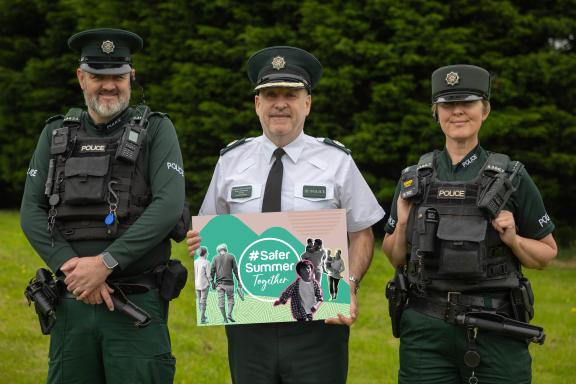 ACC Ryan Henderson with two neighbourhood officers